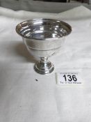 A silver chalice approximately 28 grams