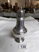 A silver sugar sifter,