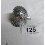 A white metal cockerel ink well