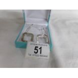 A pair of 925 silver earrings,