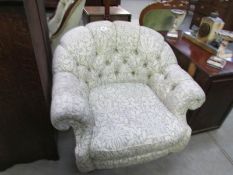 An upholstered easy chair