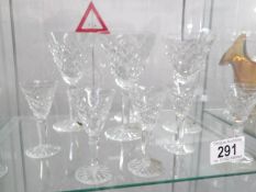 4 large and 6 smaller cut glass wine glasses