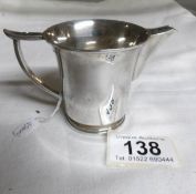 An Anglo Indian Colonial silver jug made by Cook & Charley, 1920, 90 Court House Street, Clevely,