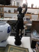 A Russian black lacquered spelter figure