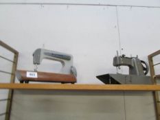 A Grey 'Vulcan' child's sewing machine and a grey 'grain' child's sewing machine