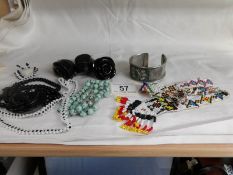 A tribal beaded necklace and other jewellery