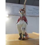 A Rye pottery figure of a fox in hunting outfit