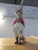 A Rye pottery figure of a fox in hunting outfit