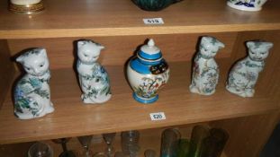 2 pairs of pottery cats and a lidded jar