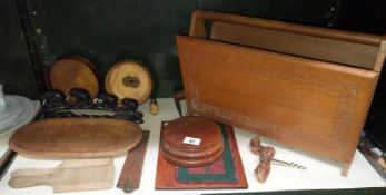 A shelf of wooden items including magazine rack