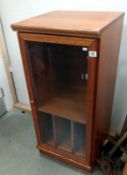 A teak music cabinet