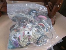 A bag of costume jewellery