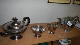 A Silver plate tea set and a silver plate teapot