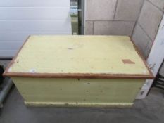 A painted pine blanket box