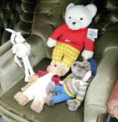 A Rupert bear and other soft toys