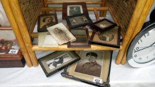A quantity of old framed photographs