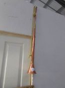 A copper post horn