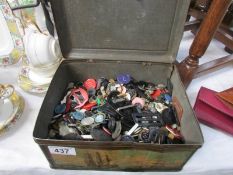 A tin of old buttons