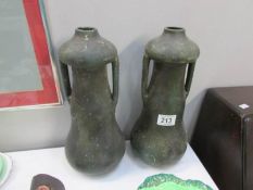 A pair of pottery vases