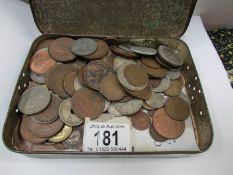 A tin of GB and foreign coins