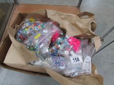 A mixed lot of bags of craft beads