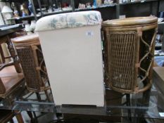 A pair of bamboo stools and a linen bin