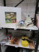 2 shelves of kitchen ware including a set of new pans