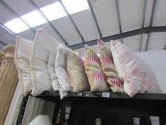 8 assorted cushions