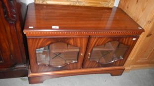 A mahogany effect television stand