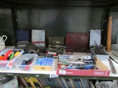 A shelf of assorted tools