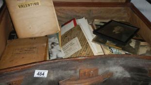 A vintage suitcase full of film related scrap books and ephemera - Rudolph Valentino, Laurel and