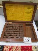 A boxed set of Imperial Typewriter Co., type heads, incomplete