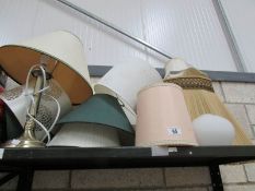 A table lamp and quantity of lamp shades