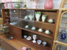 A glazed sliding door cabinet