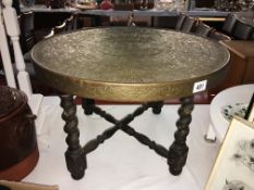 A brass topped table