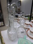 3 glass decanters and 2 champagne flutes