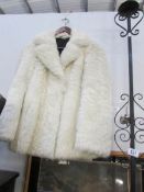 A white fur jacket