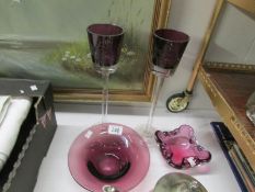 4 pieces of amethyst coloured glass