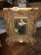 A gilt framed study of a child