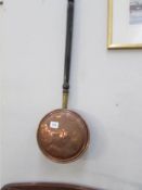 A copper warming pan