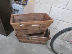 2 wooden plant troughs