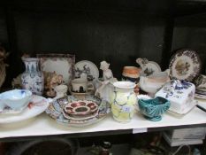 A shelf of miscellaneous china