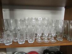 A mixed lot of drinking glasses including tumblers, wine glasses etc,