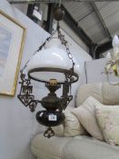 An oil lamp style ceiling light