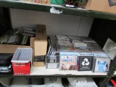A shelf of assorted CD's