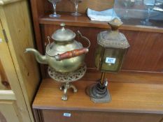 A brass kettle,