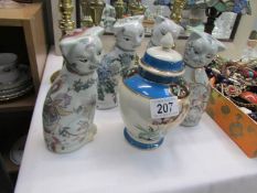 A Noritake lidded jar and 2 pairs of Staffordshire pottery cats