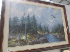 An oil on canvas of mountains and forest with eagle in flight