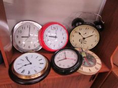 6 assorted circular wall clocks