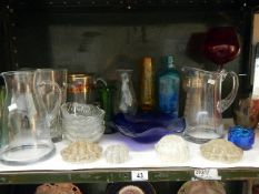 A quantity of old glassware